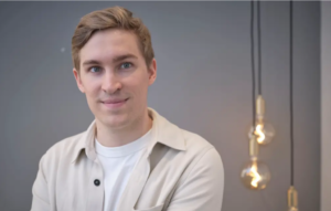 Portrait photo of a business man smiling to camera