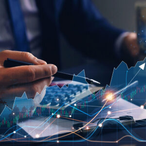 Business person examining figures on laptop with papers and charts overlayed increase arrow graph corporate future growth year 2022 to 2023. Planning,opportunity, challenge and business strategy