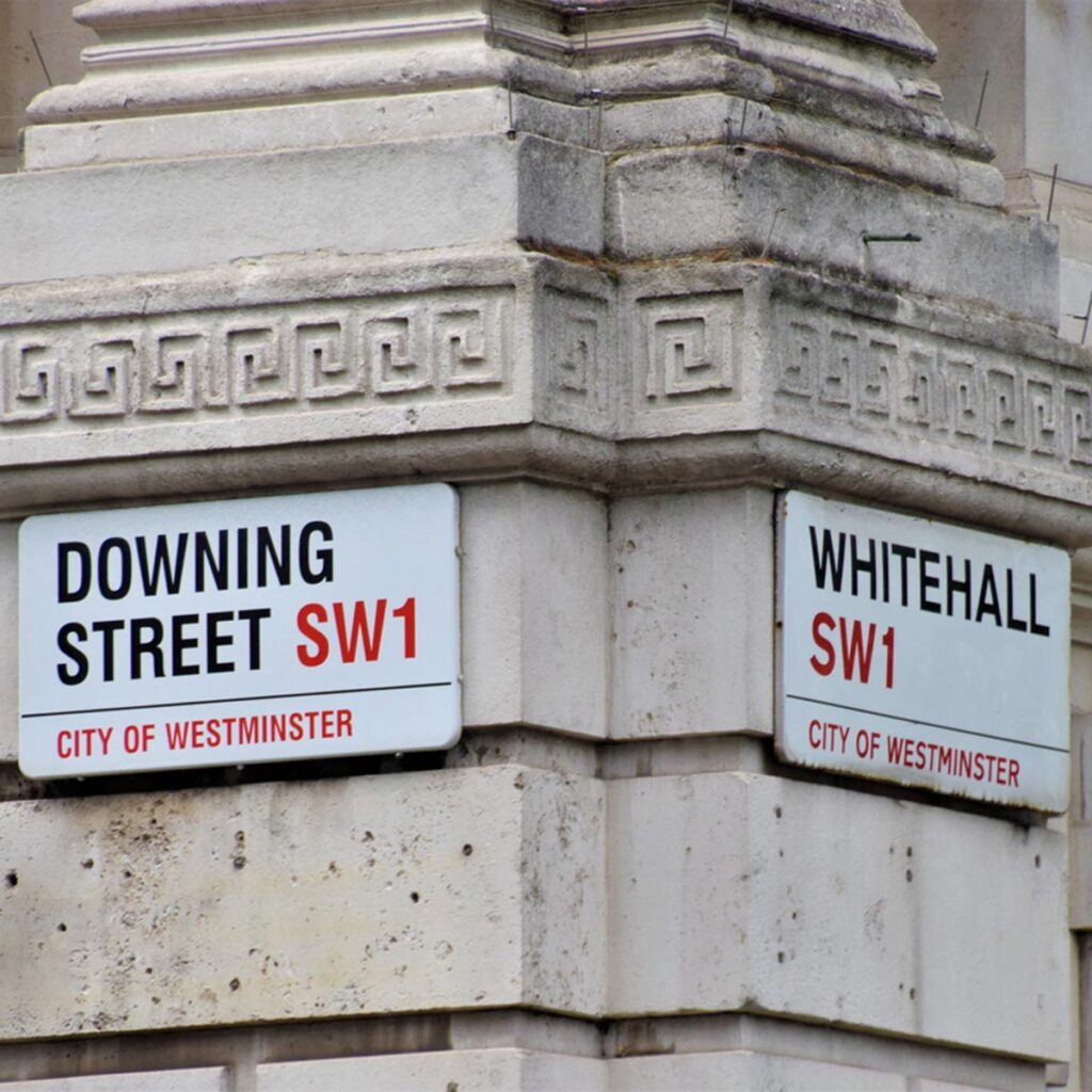 London, United Kingdom - July 10 2020: Downing Street and Whitehall street signs detail