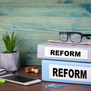 reform concept. taxes education and medical background